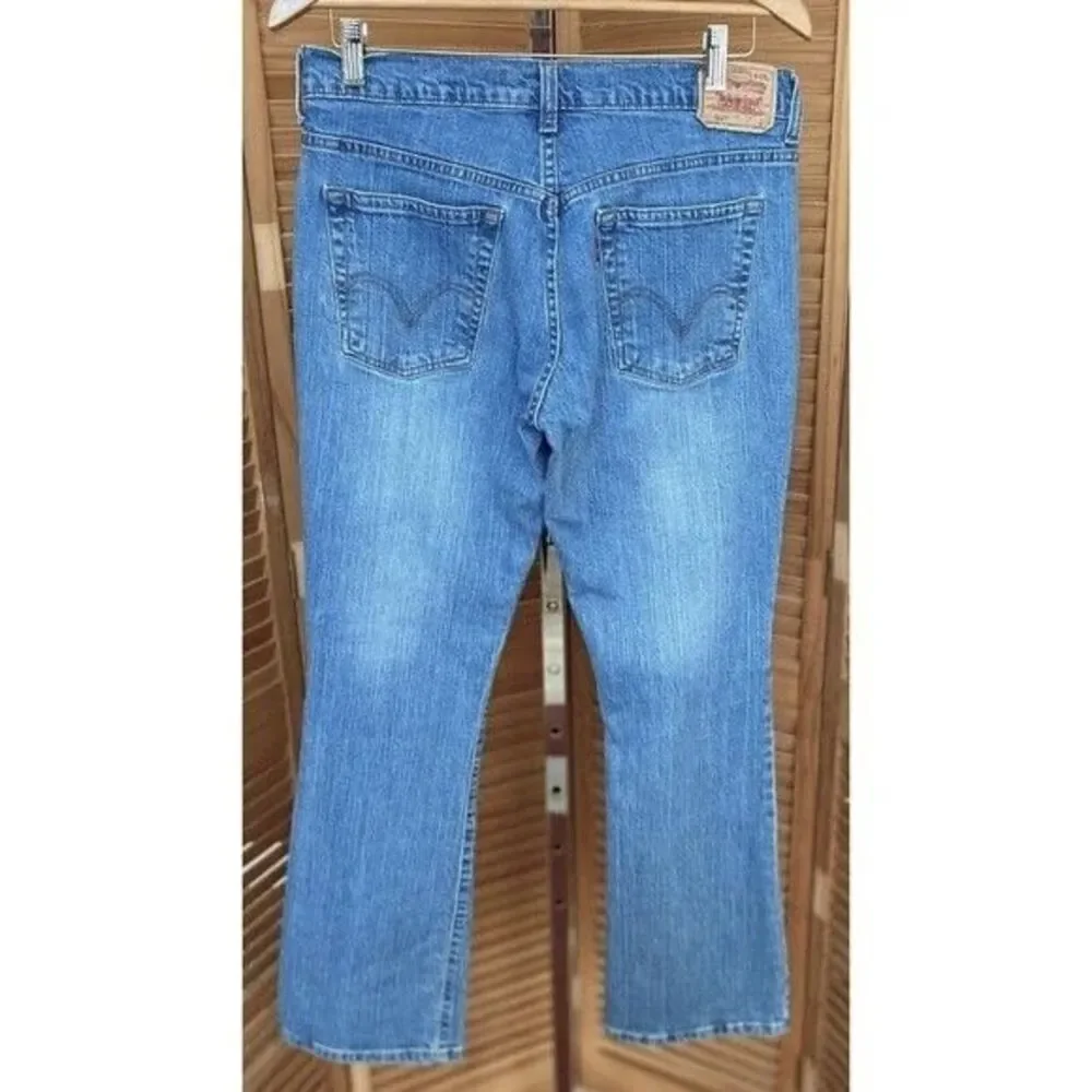 Levi's 515 Women's Nouveau Mid-Rise Boot Cut Denim Blue Jeans Size 8 MIS